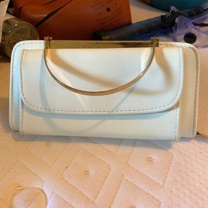 Vintage cream leather evening bag. Exterior pocket, zip close.